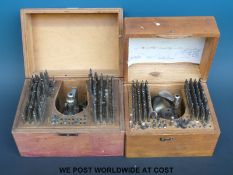 Two cased watchmaker's pin punch tool sets