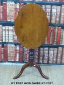 A 19thC mahogany shaped tilt top table or a tripod base