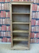 A pine bookcase (width 81cm, depth 44cm,