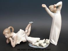 Three Lladro and Nao figures and figure groups comprising a yawning child,