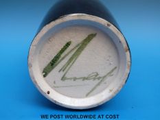 A William Moorcroft vase in Pansy pattern on a blue and pale green ground, 1920's - 1930's,