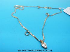 A 9ct gold necklace formed of flat links (4.