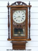 An inlaid wall clock with two-train movement,