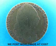 A 1785 George III guinea,