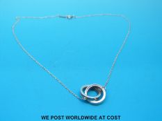 A silver necklace, marked Tiffany,