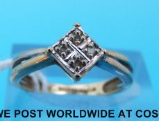 An 18ct gold ring set with five diamonds