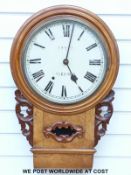 A burr walnut cased drop dial wall clock with two-train movement and Lloyd, Welchpool to the dial.