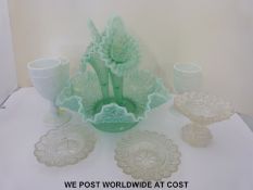 A blue opalescent pressed glass centrepiece with three removable flutes (27cm tall) together with