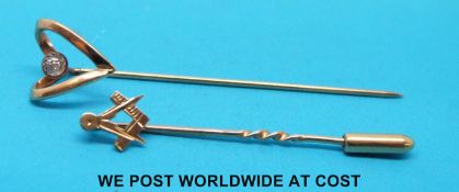 A 9ct gold Masonic stick pin and a further heart shaped stick pin