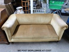 A two seat sofa raised on square tapering front legs (width 160cm)