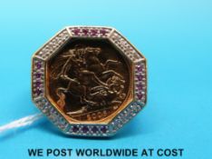 A 9ct gold ring set with a 2006 gold half sovereign,