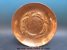 An Arts and Crafts hammered copper bowl,