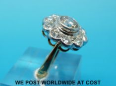 An 18ct white gold ring set with a round brilliant cut diamond of approximately 1.