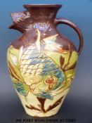 A James Dewbury Brannam Barum pottery fish ewer decorated with a carp (33cm tall)