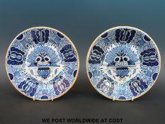 A pair of 18thC English Delft plates, one with monogram verso,