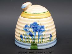 A Clarice Cliff Blue Crocus pattern honey pot with bee finial (9cm tall)