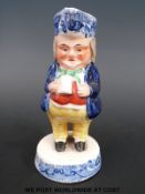 Staffordshire toby jug with willow pattern base and hat (height 14cm)