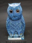 A boxed Bourjois blue bakelite owl perfume bottle holder,