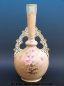 A Grainger Worcester vase with pierced decoration and painted flowers G60/6020 (37cm tall)