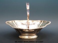 A James Dixon & Sons Victorian hallmarked silver handled basket with shaped gadrooned edge,