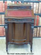 A late 19thC / early 20thC mahogany davenport with lift-up flap to top revealing pen trays etc.