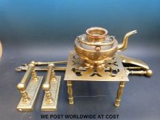 A three division oak umbrella stand, brass companion set, trivet,