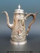 A Georgian hallmarked silver coffee pot, height 20cm,