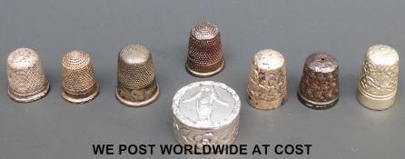 Four hallmarked silver thimbles including two Charles Horner examples,