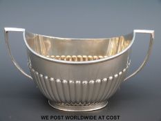 A Edward VII hallmarked silver twin handled sucrier, London 1903, Goldsmiths and Silversmiths & Co,