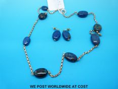 A 9ct necklace set with lapis lazuli beads with matching earrings