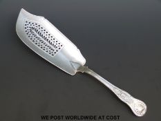 A Georgian hallmarked Kings pattern fish server, London 1825 maker's mark rubbed,