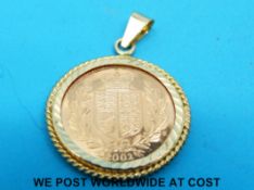 A 9ct gold pendant set with a 2002 gold half sovereign (5.