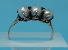 A vintage three pearl ring