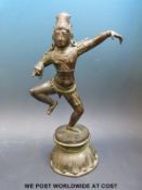 A bronze or similar model of an Indian god,