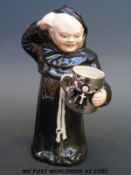 A Coalport figure of a monk