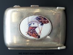 A George V hallmarked silver enamel cigarette case with horses on oval plaque to front,