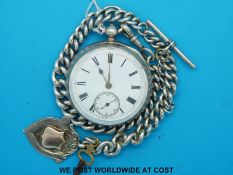 A Victorian hallmarked silver pocket watch with white enamel face and seconds dial together with a