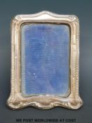 A George V hallmarked silver photo frame to suit 6 x 4