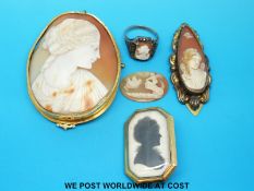 A large cameo of a young woman, a silver ring set with a cameo,