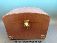 A leather jewellery travelling case,