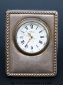 An R. Carr modern hallmarked silver travelling clock, height 6.