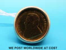 A 9ct gold ring set with a 1981 1/4 oz Krugerrand (21.