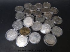 Twenty two various commemorative five pound crowns in capsules,