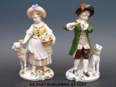 A pair of 19thC style Sitzendorf figures