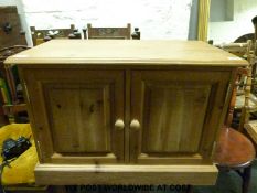 A small pine cupboard (width 76cm, depth 41cm,