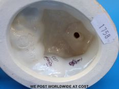 A pair of c1880's Royal Worcester blush ivory figural candlesticks in the form of a young boy &