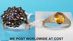 A 9ct gold ring set with a cluster of sapphires and a 9ct gold ring set with citrine