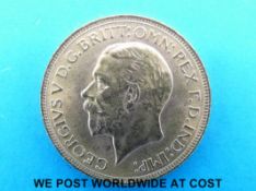 A 1930 South African gold full sovereign,