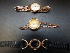 Three 9ct gold ladies wristwatches,
