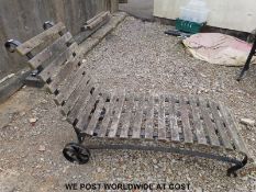 A vintage garden lounger on wheels